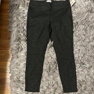 Beautiful black pants with silver accents. Size Large. Brand new with tags.